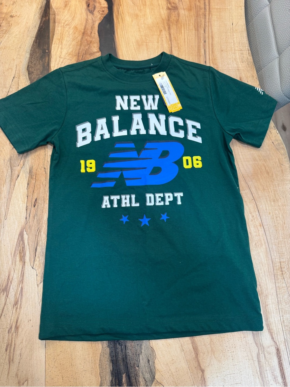 New Balance Dark Green Graphic Logo Tee with Blue & Yellow Accents